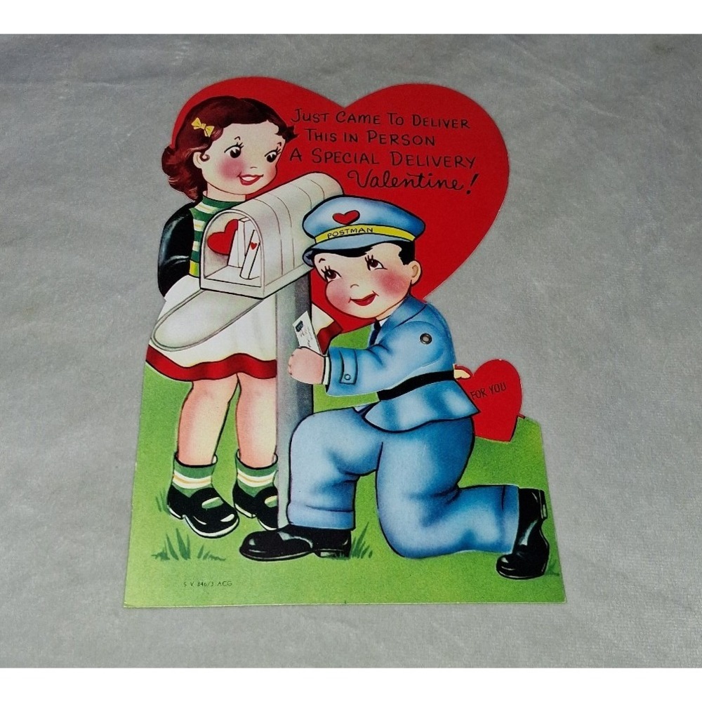 Vintage mechanical die cut Valentine featuring a postman delivering‎ a letter